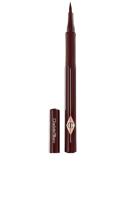 Shop Charlotte Tilbury The Feline Flick Liquid Eyeliner In Super Brown