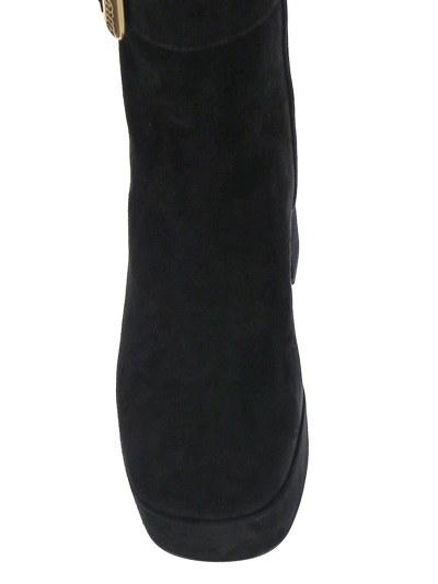 Shop Miu Miu Black Wedge Ankle Boots In Nero