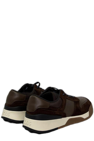 Shop Tod's Logo-embossed Panelled Lace-up Sneakers Tods In Brown