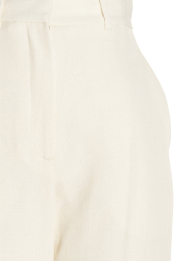 Shop Casablanca Pin Tuck Trousers In Off White