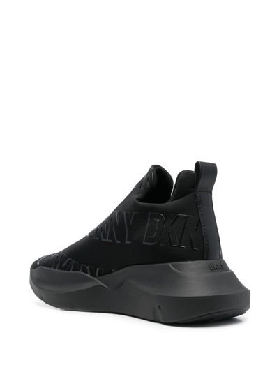 Shop Dkny Ramona Logo-print Slip-on Sneakers In Schwarz