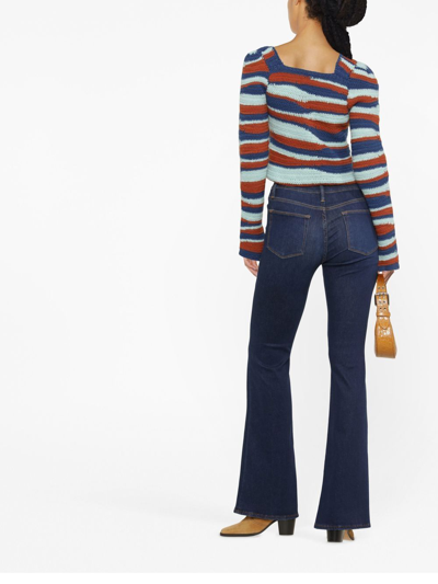 Shop Frame High-rise Flared Jeans In Blue