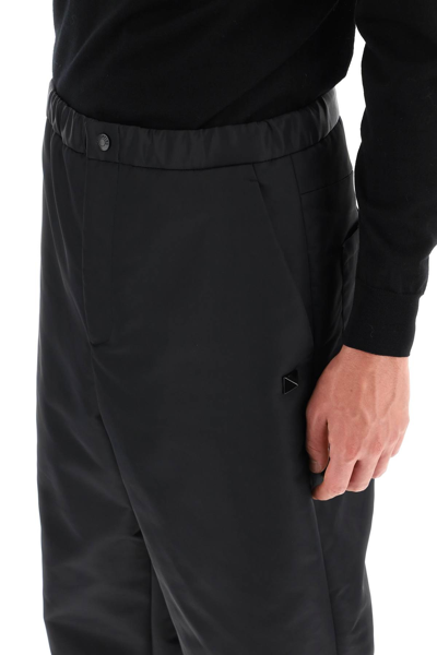 Shop Valentino Nylon Cargo Pants With Roman Stud Detail In Black