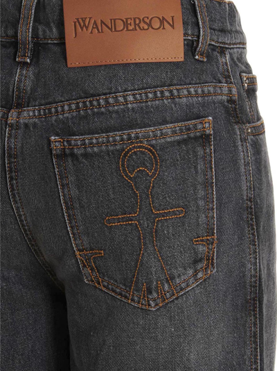 Shop Jw Anderson Cut-out Logo Jeans In Gray