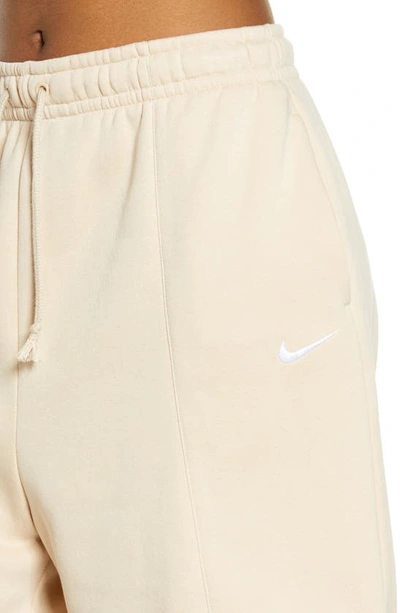 Shop Nike Sportswear Essential Fleece Shorts In Sanddrift/ White
