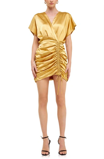 Shop Endless Rose Ruched Satin Minidress In Gold