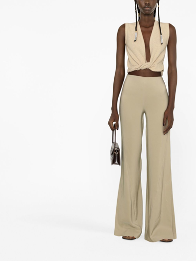 Jacquemus Soffio Flared Trousers In Nude
