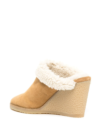 Shop Isabel Marant Shearling Wedge Mules In Braun