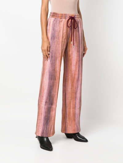 Shop Andersson Bell Tie-dye Drawstring Trousers In Orange