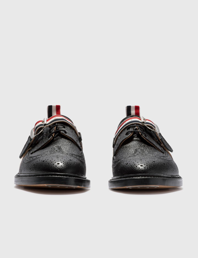 Shop Thom Browne Classic Long Wingtip Brogue With Grosgrain Strap In Black