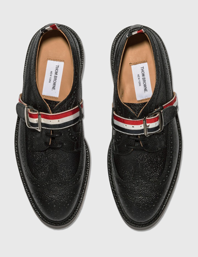 Shop Thom Browne Classic Long Wingtip Brogue With Grosgrain Strap In Black