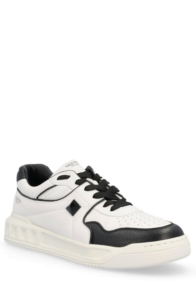 Shop Valentino Roman Stud Lace-up Sneakers In White