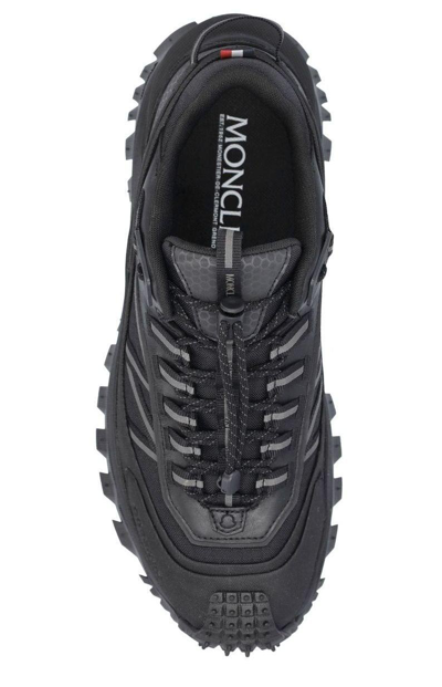 Shop Moncler Logo Detailed Lace-up Sneakers In Black