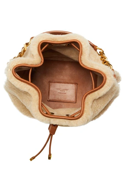 Shop Saint Laurent Emmanuel Genuine Shearling & Leather Bucket Bag In Natural Beige/ Brick