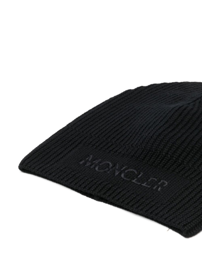 Shop Moncler - Embroidered-logo Knitted Beanie In Black