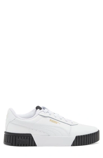 Shop Puma Carina 2.0 Sneaker In White-white-team Gold-black