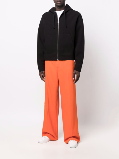 Shop Ami Alexandre Mattiussi Wide-leg Tailored Trousers In Orange