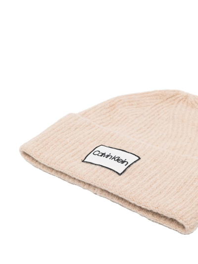 Shop Calvin Klein Logo-patch Ribbed Beanie In Nude