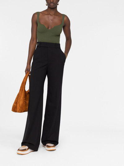 Shop Chloé High-waisted Flared Trousers In Black