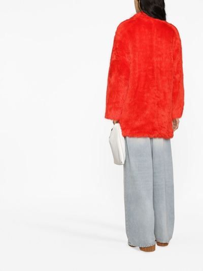 Shop Msgm Faux-fur Buttoned-up Coat In Orange