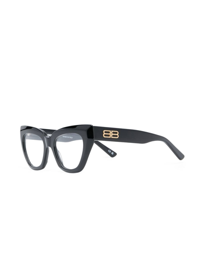 Shop Balenciaga Logo-plaque Cat-eye Glasses In Schwarz