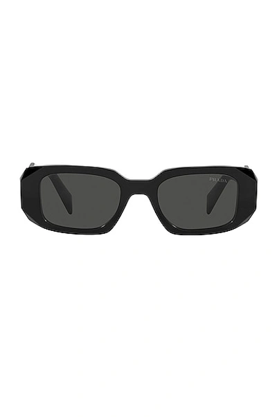Shop Prada Scultoreo Narrow Sunglasses In Black