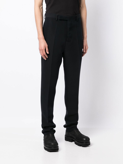 Shop Rick Owens Pleated Tapered-leg Trousers In Blue