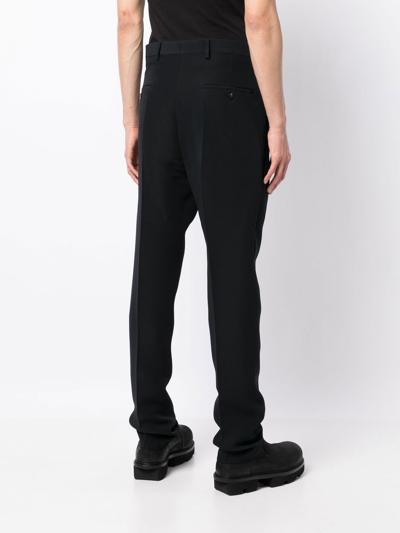 Shop Rick Owens Pleated Tapered-leg Trousers In Blue