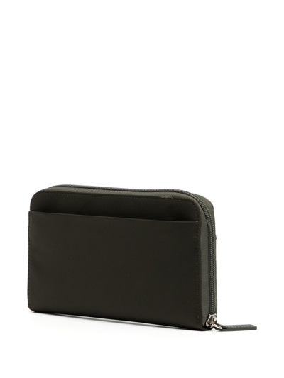 Shop Agnès B. Logo-patch Messenger Bag In Green