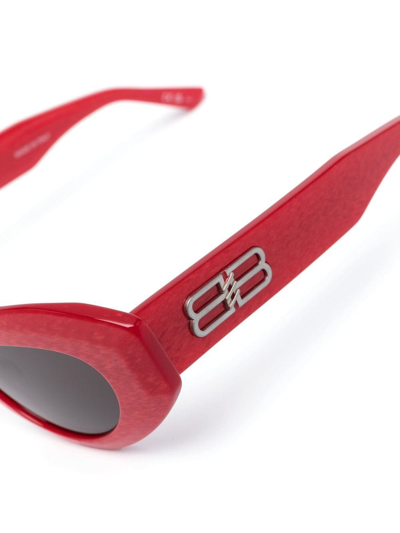 Shop Balenciaga Logo-plaque Cat-eye Sunglasses In Red