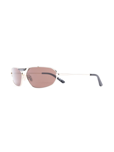 Shop Balenciaga Oval-frame Design Sunglasses In Gold