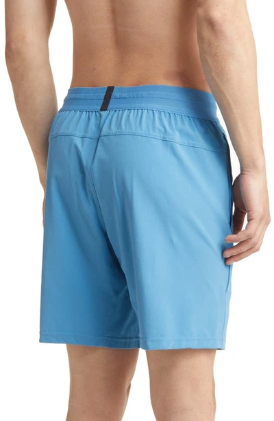 Shop Nike Dri-fit Flex Pocket Yoga Shorts In Dutch Blue/ Black