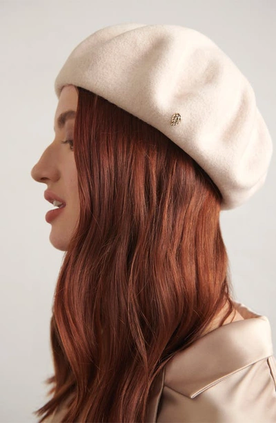 Shop Helen Kaminski Ali Merino Wool Beret In Cream