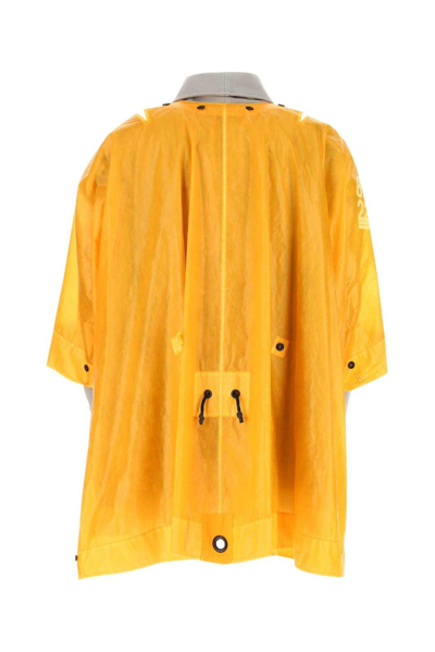 Shop Stone Island Logo-patch Cape Coat In Yellow