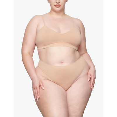 Skims Smoothing Mid-rise Stretch-woven Thong In Clay