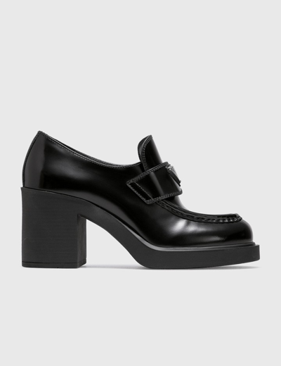 Shop Prada Chocolate High-heeled Brushed Leather Loafers In Black