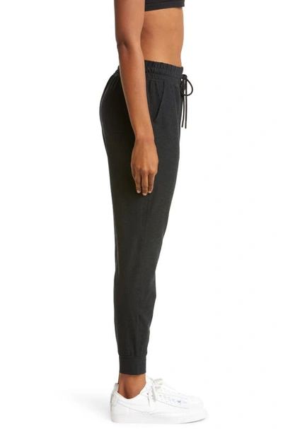 Shop Beyond Yoga Commuter Space Dye Midi Joggers In Darkest Night