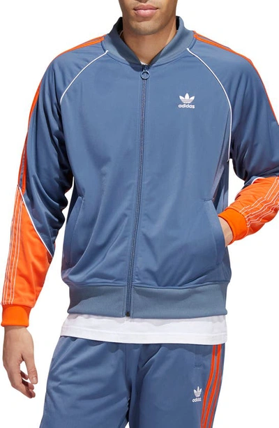 Adidas Originals Sst Tricot Track Jacket In Wonder Steel/ Orange/ White |  ModeSens