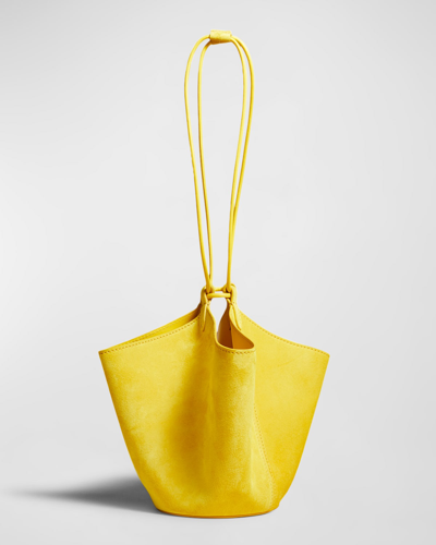 Shop Khaite Lotus Mini Drawstring Suede Bucket Bag In 612 Lemon