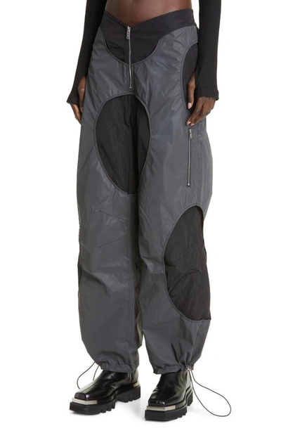 Dion Lee Reflective Overlay Parachute Pants in Black Reflective