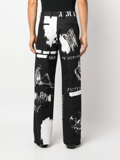 Shop Amiri Graphic-print Straight-leg Trousers In Black