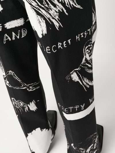 Shop Amiri Graphic-print Straight-leg Trousers In Black