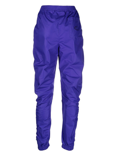 Shop Reebok Cardi B Woven Track Pants In Blue
