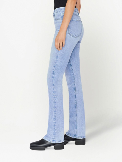 Shop Frame High-rise Flared Jeans In Blue