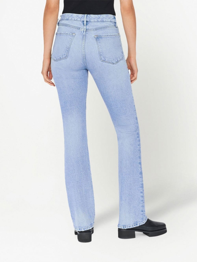 Shop Frame High-rise Flared Jeans In Blue