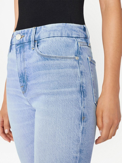 Shop Frame High-rise Flared Jeans In Blue