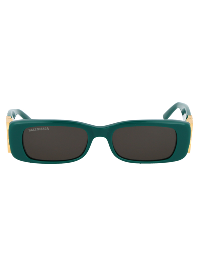 Shop Balenciaga Sunglasses In 006 Green Gold Grey