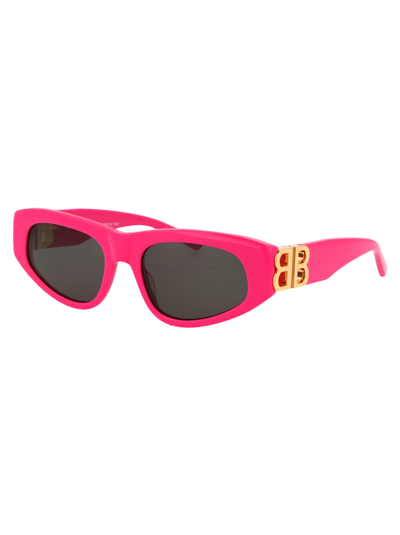 Shop Balenciaga Sunglasses In 006 Pink Gold Grey