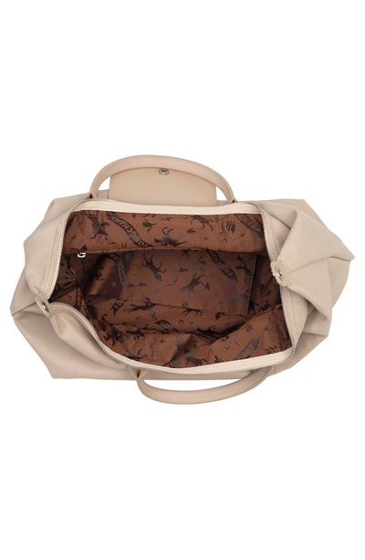 Shop Longchamp Le Pliage Cuir Top Handle Bag In Clay