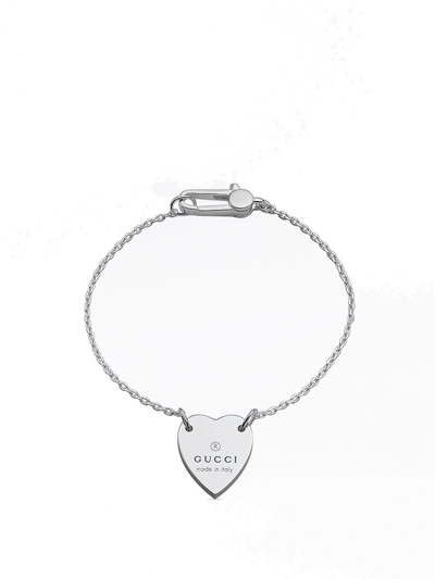 Shop Gucci Logo Engraved Heart Charm Bracelet In Silver